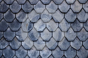 Aged slate roof tiles close-up