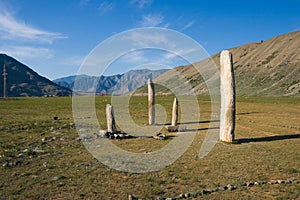 Aged stone obelisks in Altai mountains, Russia photo