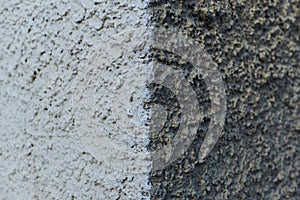 Viejo blanco a negro aislamiento muro textura grano bruto superficie bajo construcción en, oriental Europa 