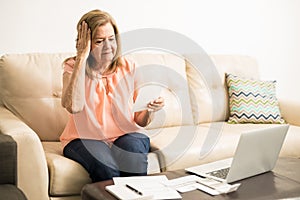 Aged woman with bad finances