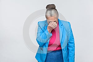 Aged woman cry and have bad mood