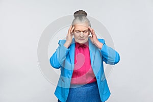 Aged woman have migraine and headache pain