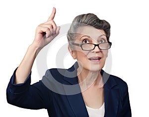 Aged woman pointing her finger upwards