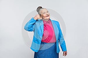 Aged woman showing call center sign