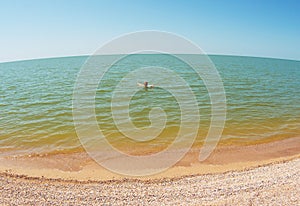 Ageing woman in sea water