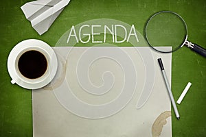 Agenda concept on blackboard with empty paper photo