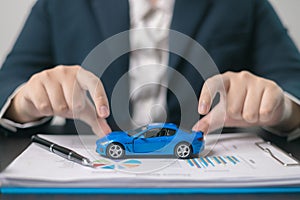 Agent facilitated a business deal, finalizing the agreement for automobile insurance to protect the vehicle during transport. car