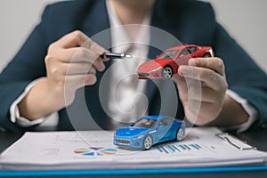 Agent facilitated a business deal, finalizing the agreement for automobile insurance to protect the vehicle during transport. car