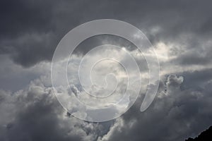 Agglomerations of clouds torn by the rays of the sun