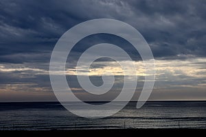 Agglomerations of clouds torn by the rays of the sun