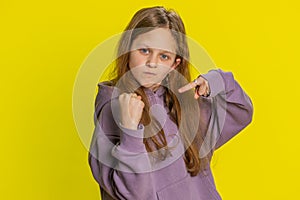 Aggressive angry child girl trying to fight at camera, shaking fist, boxing, punishment, threaten