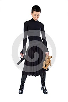 The aggressive girl with a pistol and teddy bear