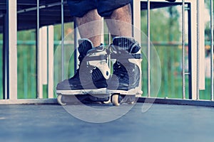 Aggressive inline skater in skatepark