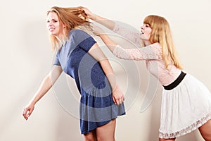 Aggressive mad women fighting each other.