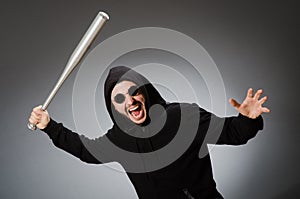 The aggressive man with basebal bat