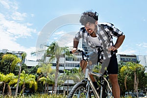 Aggressive man riding bike in the city