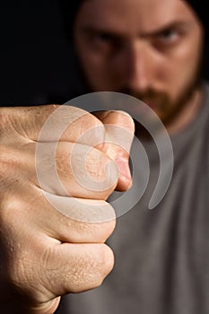 Aggressive man showing his fist