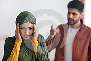 Aggressive Middle Eastern Husband Shouting At Wife At Home