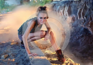 Aggressive military-style glamour girl photo