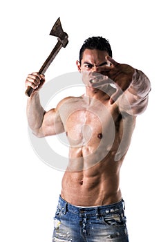 Aggressive, violent muscular young man with axe in his hand