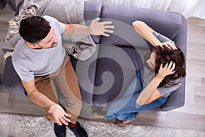 Aggressive wife fighting with his husband