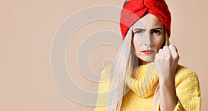 Aggressive woman show fist ready to fight expression emotion in fashion sunglasses yellow sweater