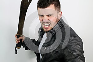 Aggressive young man with a sword