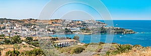 Agia Pelagia is a small town with a beautiful beach at Bay Aghia Pelaghia near Heraklion, Crete, Greece. Panoramic view HD Agia Pe