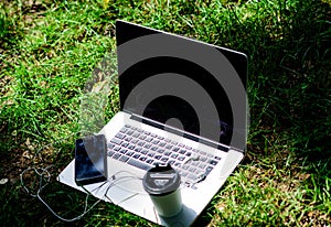 Agile business. Online study. working place outdoor. Free music. summer vibes. Relax. notebook with headset of mobile