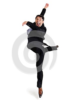 Agile businessman doing a pirouette