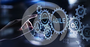 Agile development methodology concept on virtual screen. Technology concept