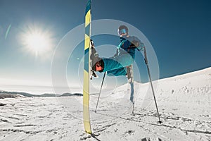 Agile skier doing a trick standing still