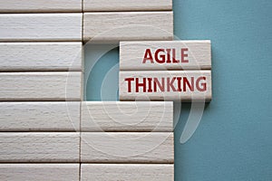 Agile Thinking symbol. Wooden blocks with words Agile Thinking. Beautiful grey greenbackground with. Business and Agile Thinking