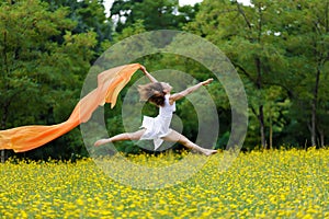 Agile woman leaping in the air photo