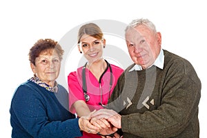 Aging couple with their kind assistant