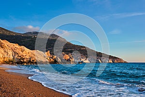 Agios Ioannis beach on sunset. Milos island, Greece