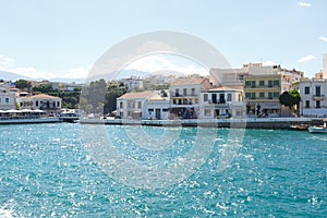 AGIOS NIKOLAOS, CRETE, GREECE - JULY 4, 2014: View from the waterfront to the Central part of the city. Agios Nikolaos, Crete,