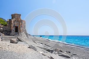 Agios Pavlos beach with Saint Paul church, a very old Byzantine church that was built at the place Selouda.