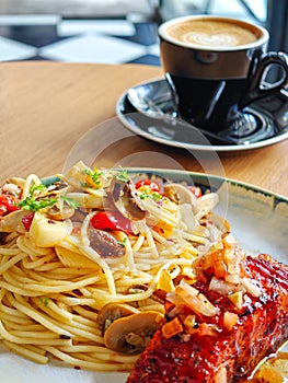 Aglio Olio Spaghetti with salmon fish photo