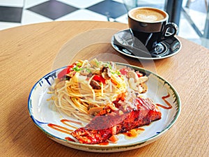 Aglio Olio Spaghetti with salmon fish photo