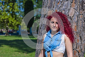 Agnese girl model with hair red end blue jeans