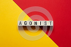 Agonist word concept on cubes photo