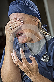 Agonizing Crying Female Doctor or Nurse