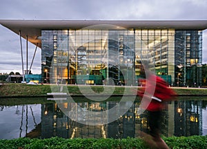 Agora building Council of Europe Strasbourg France man jogging