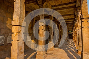 Agra, India - September 20, 2017: Columns with stone carving in courtyard of Quwwat-Ul-Islam mosque, Qutub Minar complex