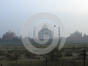 Agra, Uttar Pradesh, India - 08 Jan 2021 : Sunrise and morning fog at the Taj Mahal in Agra - India