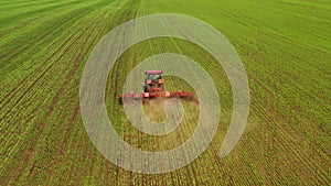 Agrarian, agricultural machinery, work in the field. Aerial photography.