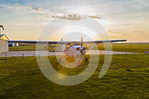 Agreement airplane parked in front of his hangar