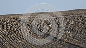 Agricultural background of newly plowed field