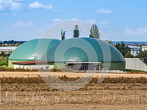 An agricultural biogas plant with fermenter and gas storage tank photo